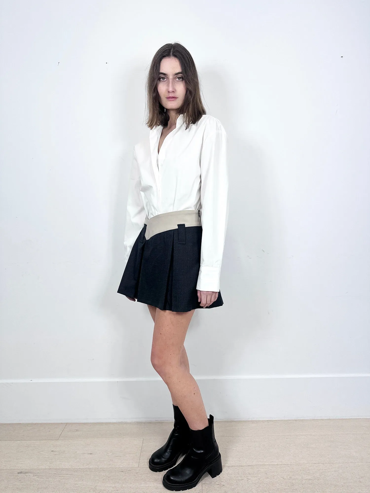 Aaizel Dipped Waist Mini Skirt