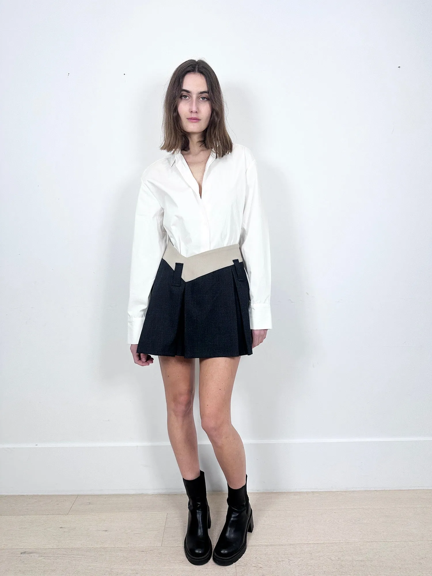 Aaizel Dipped Waist Mini Skirt