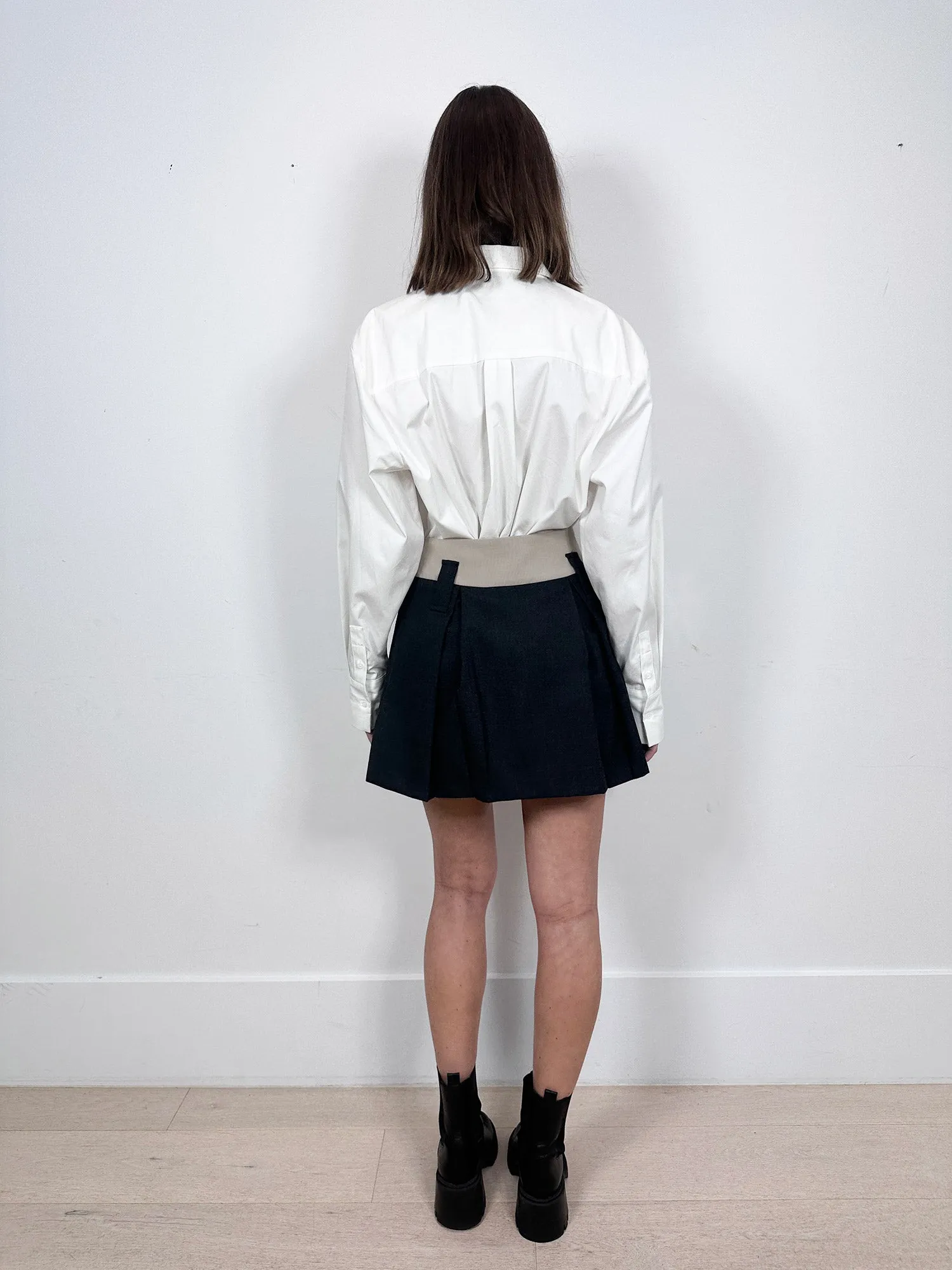 Aaizel Dipped Waist Mini Skirt