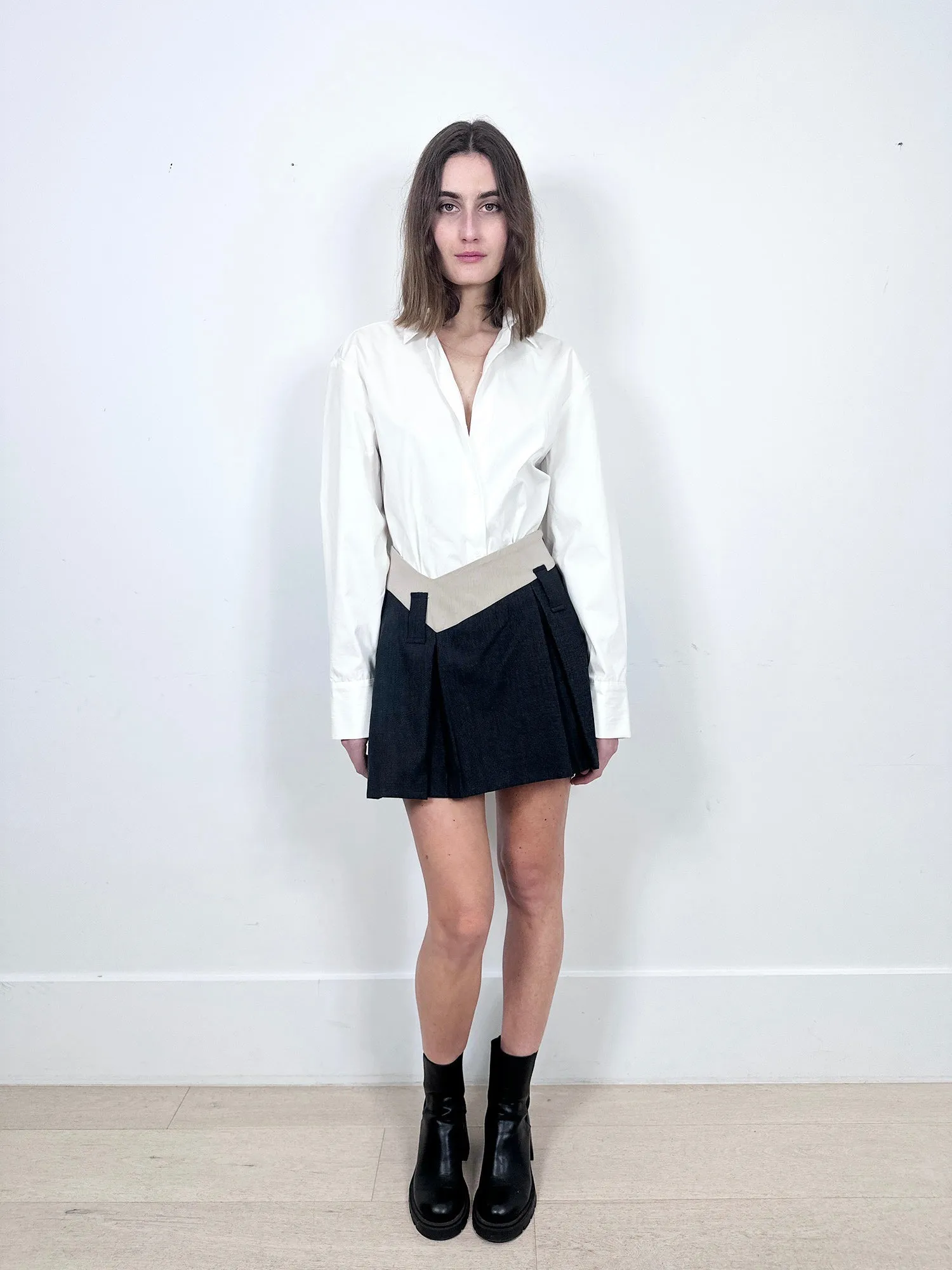 Aaizel Dipped Waist Mini Skirt