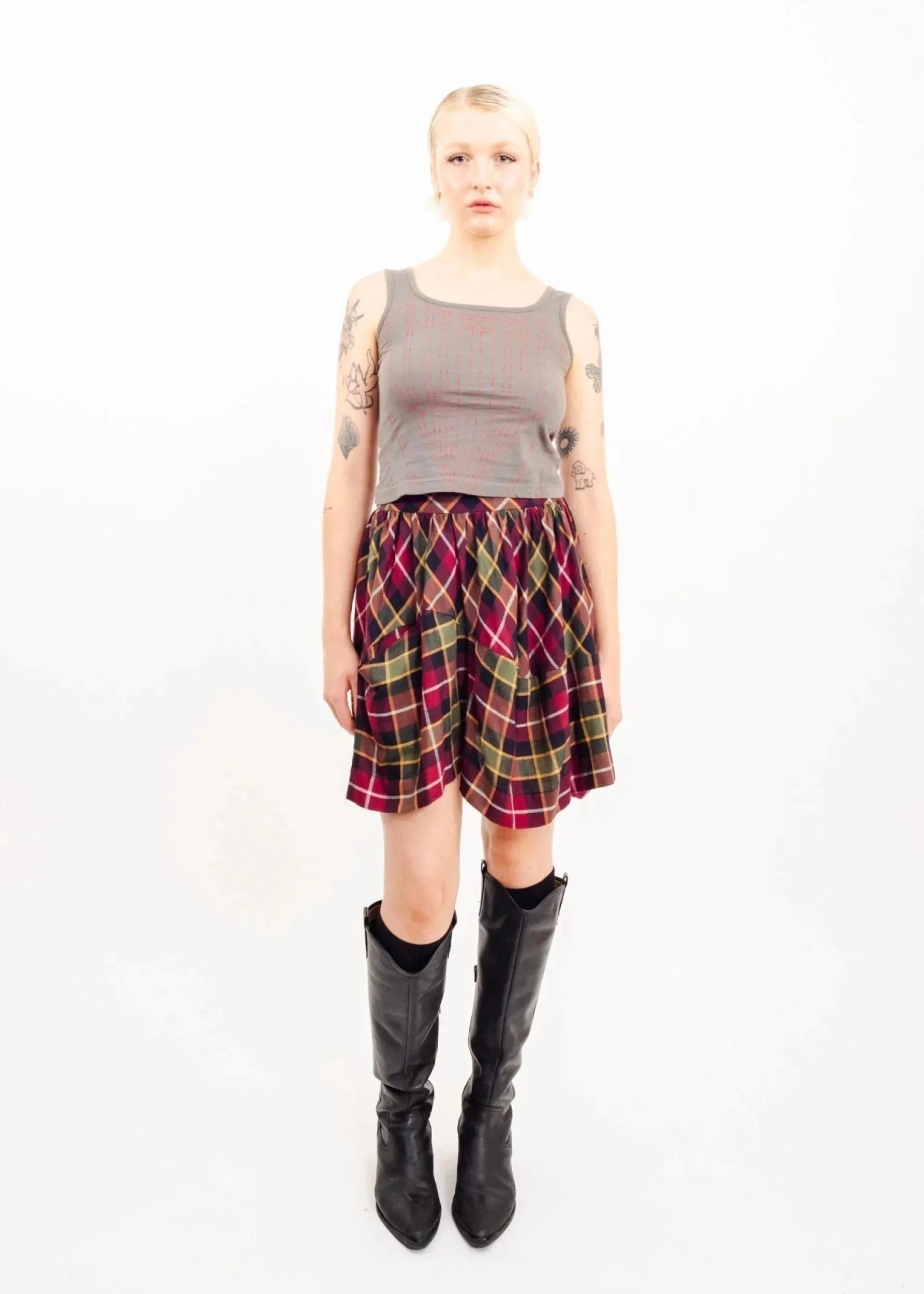 Asymmetric draped tartan skirt