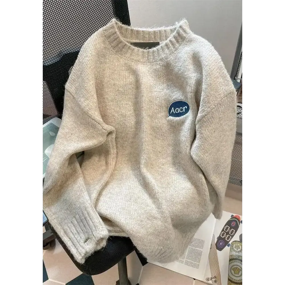 Cartoon Embroidered Knitted Sweater with Ripped Details