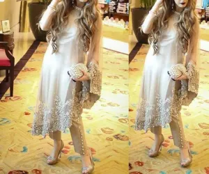 Gray shimry party dress on net cloth with cut work nagh and pearls work Model#P 31