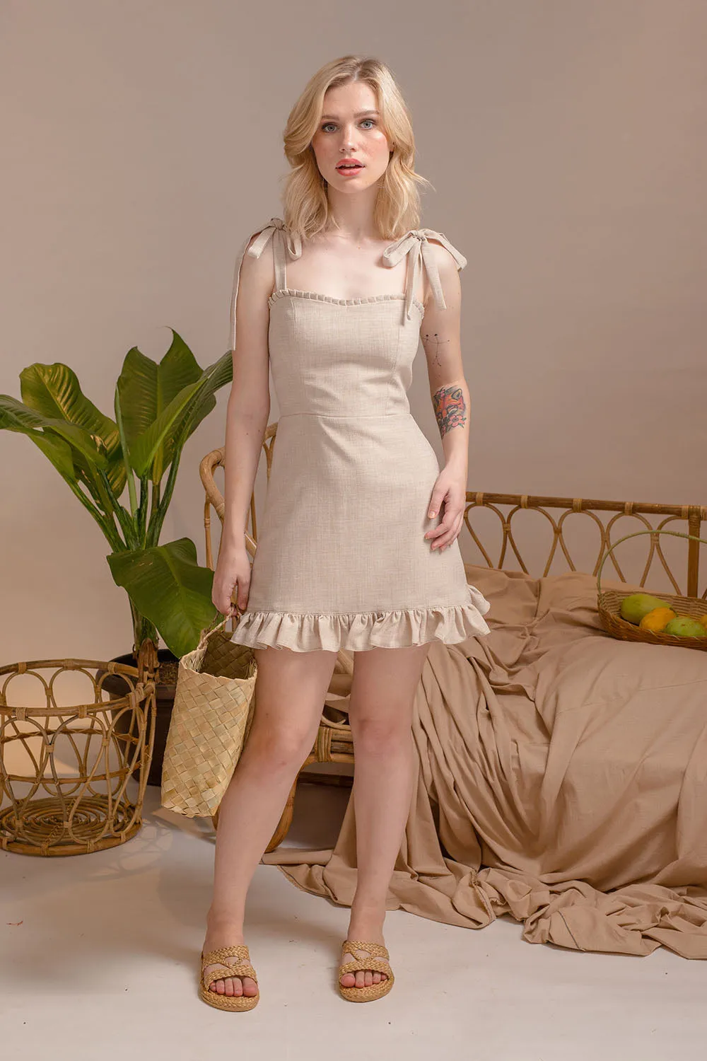 LUMINOSA Mini Dress with Bow Straps and Ruffled Skirt (Nude Linen)